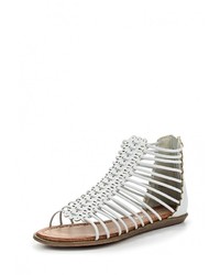 Белые кожаные сандалии на плоской подошве от Amazonga