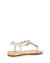 Белые кожаные сандалии на плоской подошве от Catherine