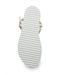 Белые кожаные сандалии на плоской подошве от Catisa