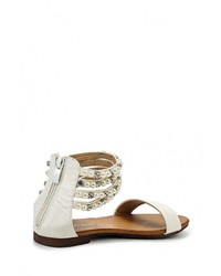 Белые кожаные сандалии на плоской подошве от Catisa