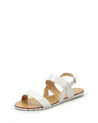 Белые кожаные сандалии на плоской подошве от Catisa