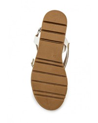 Белые кожаные сандалии на плоской подошве от Catisa