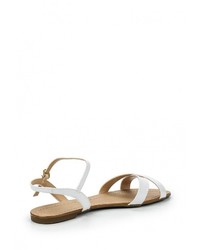 Белые кожаные сандалии на плоской подошве от Cecconello