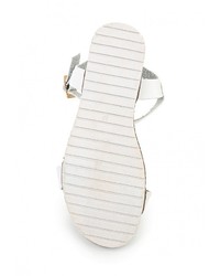 Белые кожаные сандалии на плоской подошве от Coco Perla