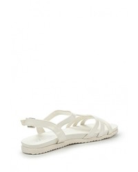 Белые кожаные сандалии на плоской подошве от Donna Moda