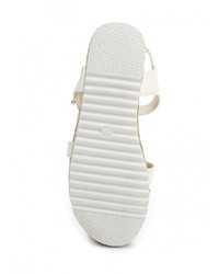 Белые кожаные сандалии на плоской подошве от Exquily
