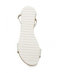 Белые кожаные сандалии на плоской подошве от Ideal