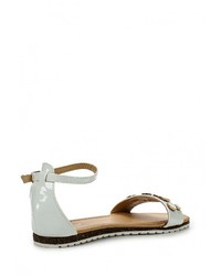 Белые кожаные сандалии на плоской подошве от Ideal