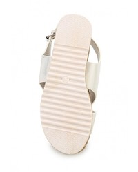 Белые кожаные сандалии на плоской подошве от Ideal