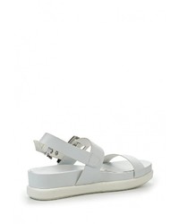 Белые кожаные сандалии на плоской подошве от Keddo