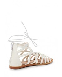 Белые кожаные сандалии на плоской подошве от Malien