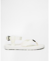 Белые кожаные сандалии на плоской подошве от Teva