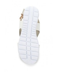 Белые кожаные сандалии на плоской подошве от Queen Vivi