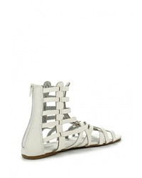 Белые кожаные сандалии на плоской подошве от Savannah