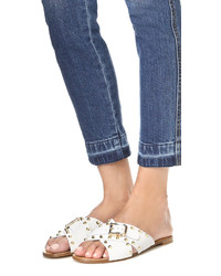 Белые кожаные сандалии на плоской подошве от Stuart Weitzman