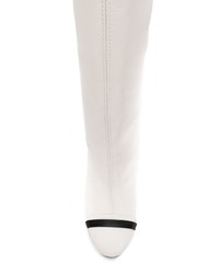 Белые кожаные сапоги от Stuart Weitzman