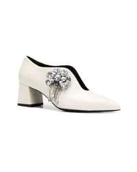 Белые кожаные туфли с украшением от Coliac