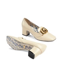 Белые кожаные туфли от Gucci