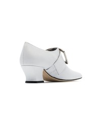Белые кожаные туфли от Dorateymur