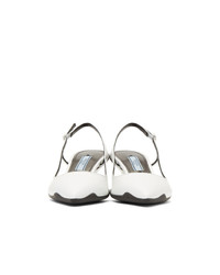 Белые кожаные туфли от Prada
