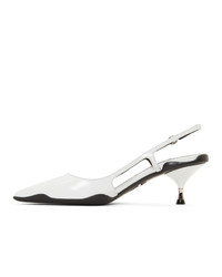 Белые кожаные туфли от Prada