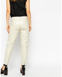 Белые кожаные узкие брюки