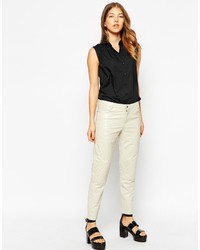 Белые кожаные узкие брюки