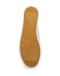 Белые кроссовки на танкетке от Ideal