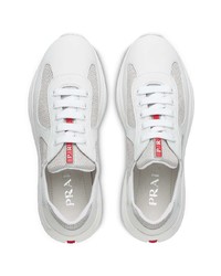 Женские белые кроссовки от Prada