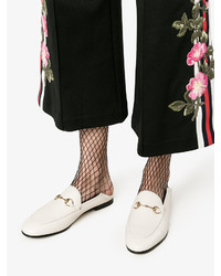 Женские белые лоферы от Gucci