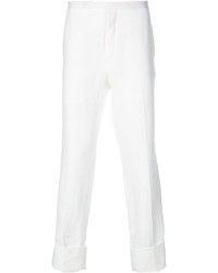 Белые льняные классические брюки в вертикальную полоску