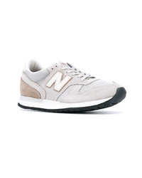 Мужские белые низкие кеды из плотной ткани от New Balance