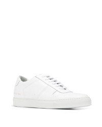 Мужские белые низкие кеды с украшением от Common Projects