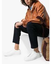 Мужские белые низкие кеды от Common Projects