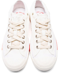 Женские белые низкие кеды от Diesel