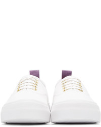 Женские белые низкие кеды от Eytys