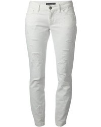 Белые рваные джинсы скинни от Dolce & Gabbana