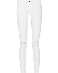 Белые рваные джинсы скинни от Frame Denim