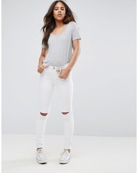 Белые рваные джинсы скинни от Glamorous