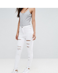 Белые рваные джинсы скинни