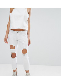Белые рваные джинсы скинни