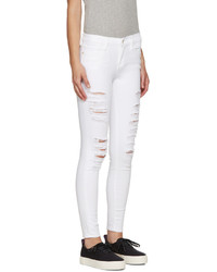 Женские белые рваные джинсы от Frame