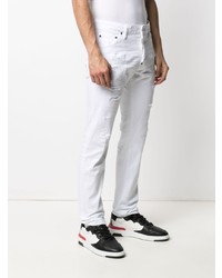 Мужские белые рваные джинсы от DSQUARED2