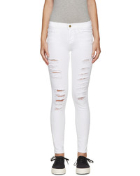 Женские белые рваные джинсы от Frame
