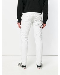 Мужские белые рваные джинсы от Marcelo Burlon County of Milan