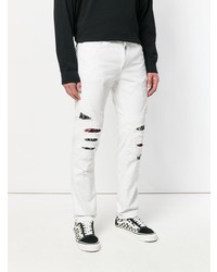 Мужские белые рваные джинсы от Marcelo Burlon County of Milan