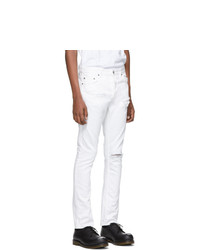 Мужские белые рваные джинсы от Ksubi