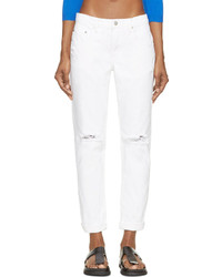 Женские белые рваные джинсы