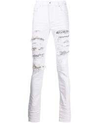 Мужские белые рваные зауженные джинсы от Amiri