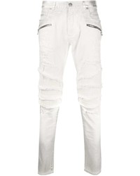 Мужские белые рваные зауженные джинсы от Balmain
